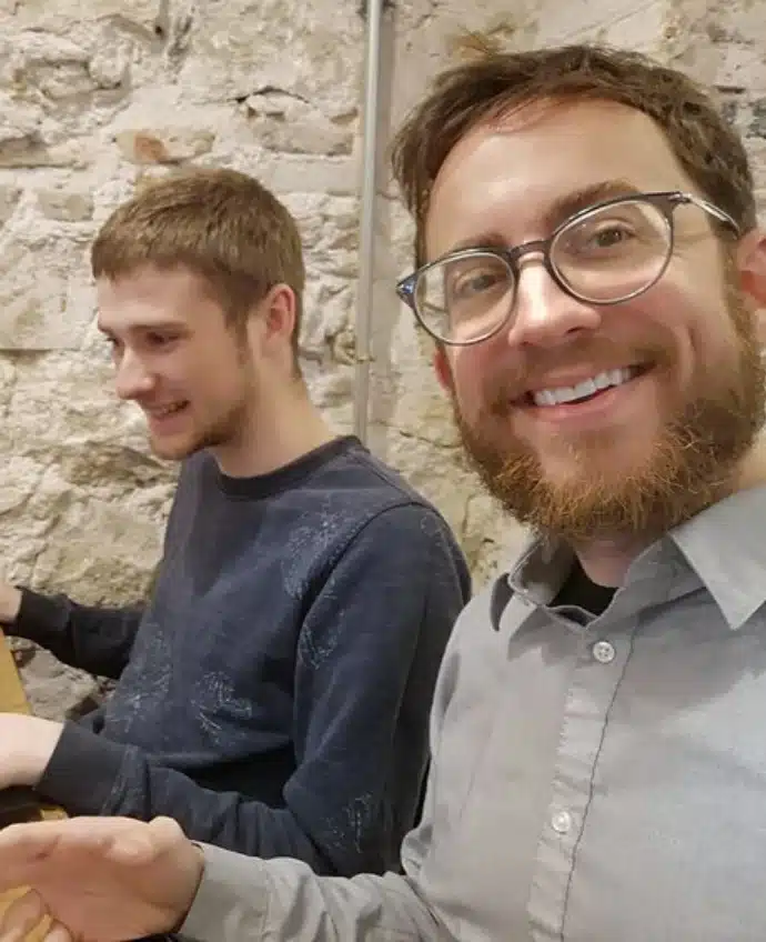 Brord and Will, co-founders of Pangea Chat, working in “some cafe” in Barcelona